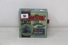 A boxed as new Andy Seb handmade One Off V Liner tattoo machine.