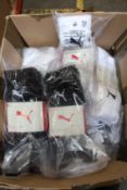 A quantity of assorted as new Puma socks.