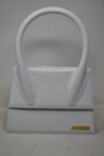 An as new Jacquemus Le grand Chiquito bag in white.