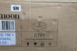 A Tikamoon ST01 Galet Nobu pebble wash basin.