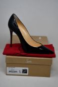 A pair of as new Christian Louboutin Kate 100 Patent shoes (EU 39).
