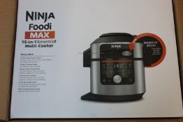 A boxed as new SharkNinja Foodi smart lid multi cooker.