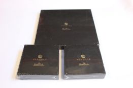 A quantity of Versace x Rosenthal homeware to include Holiday Alphabet bowls, Virtus table light and