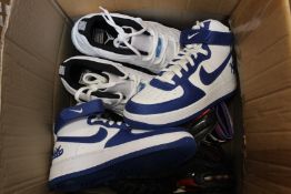 Five pairs of assorted as new Nike trainers (No boxes).