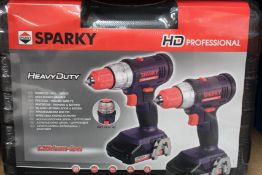 Three boxes of as new Sparky professional heavy duty drill sets.