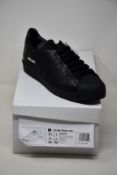 A pair of as new Adidas Prada Superstar sneakers (UK 8).