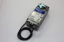 A Johnson Control proportional spring return actuator (M9220-GGA-3).
