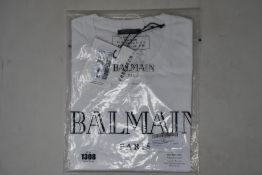 An as new Balmain white T-shirt (L).