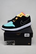 A pair of as new Nike Air Jordan 1 Low (UK 9).