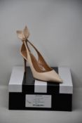 A pair of as new Aquazzura Bow Tie Pump 85 (EU 37).