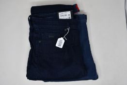 Two pairs of as new Hugo Boss jeans (W32/L32, W31/L34).