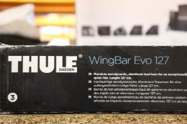 A pair of boxed as new Thule WingBar Evo 127 roof bars (711300).