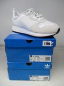 Two pairs of as new Adidas ZX 700 HD trainers (UK 9).