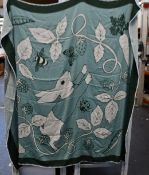 An as new Karen Mabon X Peter Rabbit woven green blanket, part of a limited-edition capsule