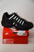 A pair of as new Nike NDSTRKT Air Max 95 (UK 10).
