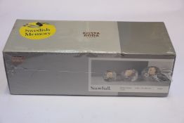 A boxed as new Kosta Boda Snowball Votive Holder Set (3 pcs H 60/70/90mm).