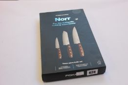 Four boxed as new Fiskars Norr three piece knife sets.