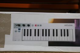 A boxed as new Arturia Keystep controller and sequencer.