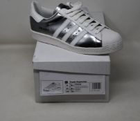 A pair of as new Adidas Prada Superstar sneakers (UK 8.5).