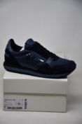 A pair of as new Emporio Armani sneakers (UK 8).