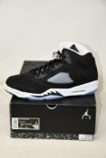 A pair of as new Nike Air Jordan 5 Retro (UK 10.5).