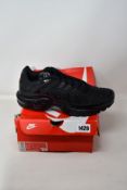A pair of as new Nike Air Max Plus (UK 10).
