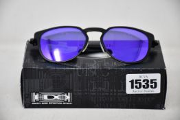 A pair of as new Oakley Diecutter sunglasses.