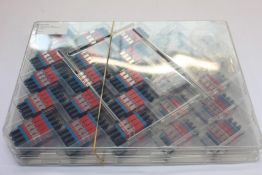 A large quantity of Diamond Fibre Optic E-2000 Series mating adapters and pigtails (Approximately