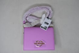 An as new Love Moschino Borsa Pu Malva bag in pink.