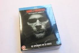 A case of as new Sons of Anarchy S1-7 Blu-Ray DVD sets (Case QTY: 7) (Over 18s only).