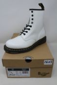 A pair of as new Dr Martens 1460 white boots (UK 5).