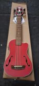 An as new Kala U-Bass Journeman ukulele bass guitar in mahogany matte red.