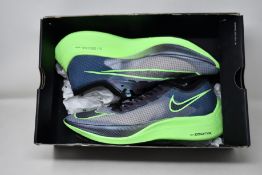A pair of as new Nike Zoomx Vaporfly Next (UK 11.5 - No box lid).