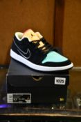 A pair of as new Nike Air Jordan 1 Low (UK 9.5).