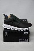 A pair of men's as new On Running Cloud Hi waterproof trainers (UK 10.5).