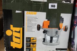 A pre-owned Triton dual mode precision plunge router 2400W.