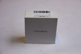 Fifty three pairs of TWS earbuds in charging cases.