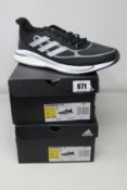 Two pairs of as new Adidas Supernova + M trainers (UK 7).