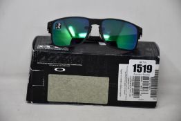 A pair of as new Oakley Holbrook Metal sunglasses.