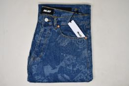 A pair of as new Palace jeans (32