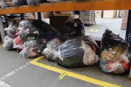 Nine bags of pre-owned clothing and related items.