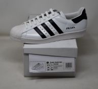 A pair of as new Adidas Prada Superstar sneakers (UK 11).