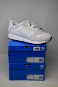 Two pairs of as new Adidas ZX 700 HD trainers (UK 8.5).