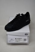 A pair of as new Adidas Prada Superstar sneakers (UK 9).