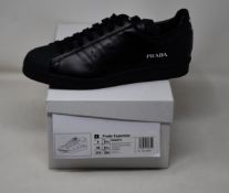 A pair of as new Adidas Prada Superstar sneakers (UK 8.5).