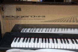 A pre-owned Yamaha Piaggero NP12-B Keyboard.