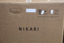 A boxed as new Nikari medium oak April table.