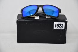 A pair of as new Oakley Holbrook XL sunglasses.