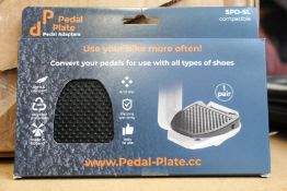 A large quantity of Pedal Plate SPD/X-Track and KEO compatible adaptors (Approximately 200 items).