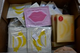 A quantity of KNC all natural retinol infused eye masks and a quantity of KNC all natural collagen